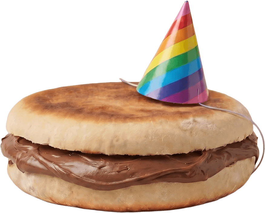 Gordita de nata con gorrito de cumpleaños